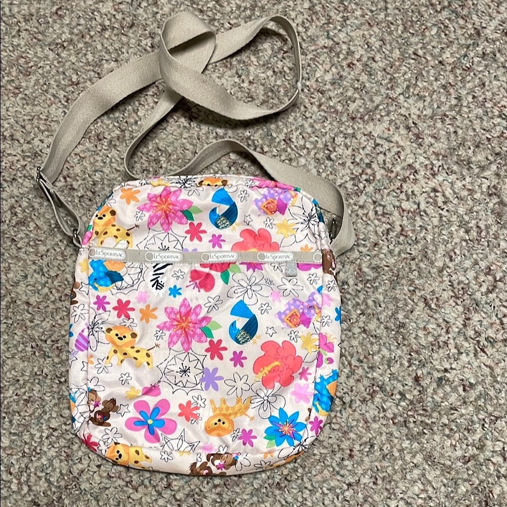 Disney le sportsac it’s a small world limited edition animal print Crossbody Bag